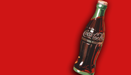 Coca-Cola bottle on red background